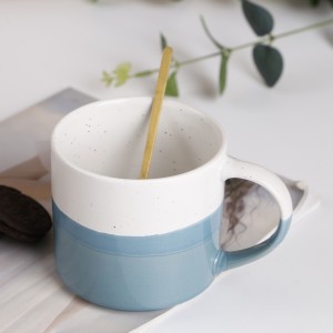 Dipped glaze mug with speckles