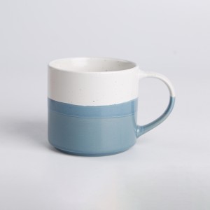 Dipped glaze mug with speckles